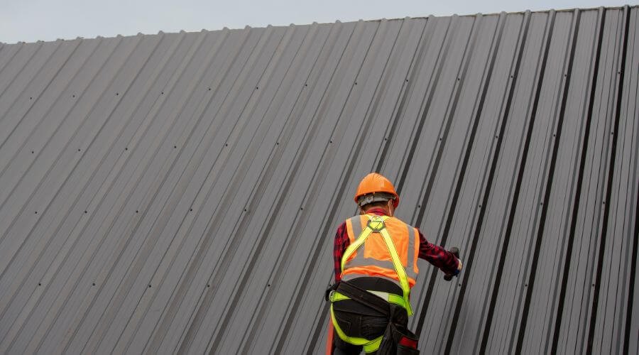 Professional metal roof installation services in Orestes, IN